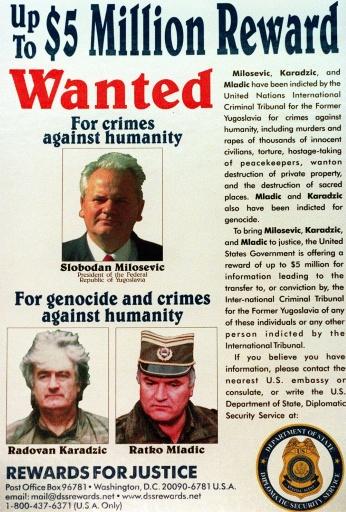 A 2000 US wanted poster for Slobodan Milosevic, Radovan Karadzic and Ratko Mladic — GEORGE BRIDGES / AFP