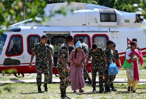 Nepal seeking to reach survivors in tunnel as risk of new floods rises