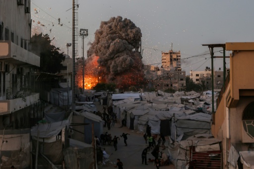 Lors d'une frappe israélienne sur Gaza le 28 juillet 2026 — Omar AL-QATTAA / AFP