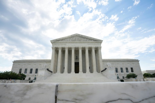 Top court upholds Trump bid to curb mail-in ballots for now