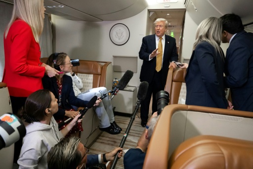 US President Donald Trump speaks to reporters on the new plane