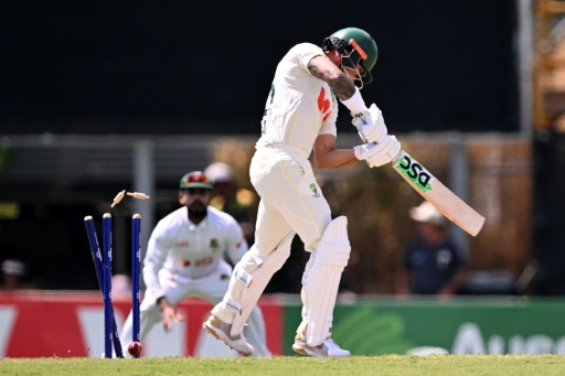 Australian batsman Jake Weatherald is bowled on the third day of the first Test — William WEST / AFP