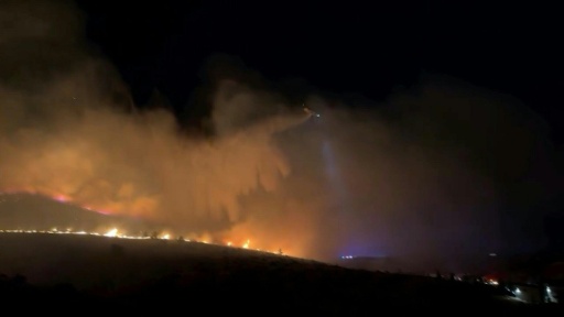 Tens of thousands evacuated as fire bears down on US city
