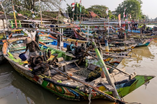 Indonesians are driven to work on foreign-flagged fishing vessels due to lack of opportunities at home, a campaigner says — BAY ISMOYO / AFP
