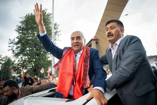 Former Nepal premier Deuba returns home, faces graft probe