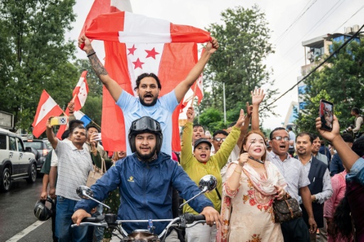 Supporters gather to welcome Nepal's former prime minister Sher Bahadur Deuba near the Kathmandu airport — Prabin Ranabhat / AFP