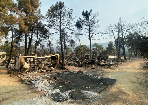 Spain wildfire burns campsite to ash, leaving tears and despair