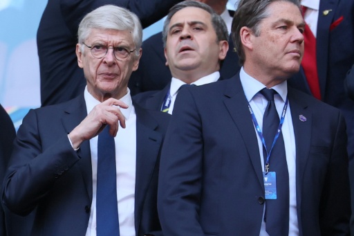 FIFA's Chief of Global Football Development Arsene Wenger (L) said he had learned of the proposal through the media — Odd ANDERSEN / AFP