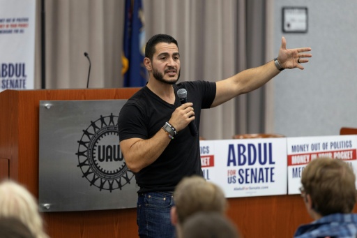 Polls open in Michigan vote testing rival visions for Democrats
