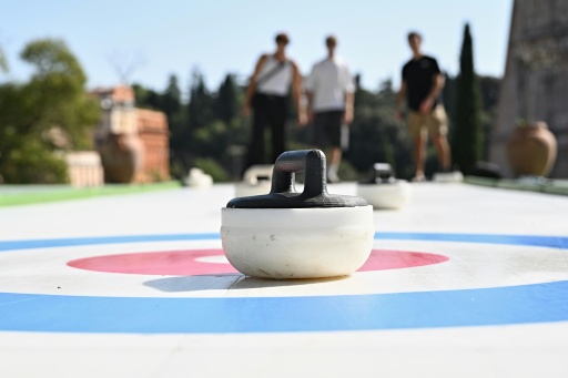 With its origins in 16th century Scotland, curling is a team sport played on ice. — Andreas SOLARO / AFP