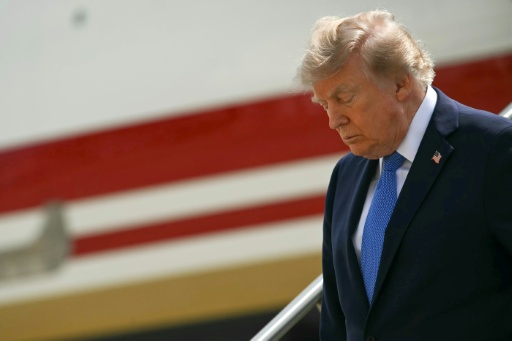 Le président américain Donald Trump descend d'Air Force One, le 14 août 2026 à New York — Kent NISHIMURA / AFP