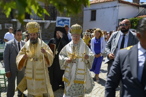 Gokceada's streets are filled for a parade led by Ecumenical Patriarch Bartholomew I — Yasin AKGUL / AFP