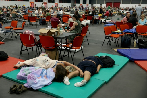 Rapidly spreading blazes have forced authorities to evacuate tens of thousands of people — ALAIN JOCARD / AFP