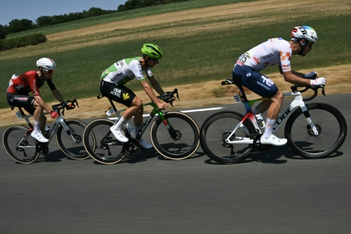 Thibault Guernalec (R) said he did not understand why Czech rider Jakub Otruba (C) Belgian Liam Slock (L) attacked each other with 40km left to ride