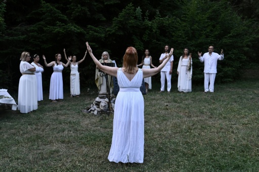Reenactors dressed as ancient Greeks perform a ritual at the foothills of Mount Olympus as part of the four-day Promitheia Festival