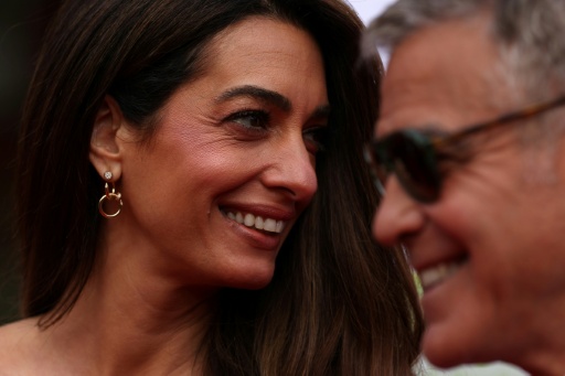 George Clooney and his wife Amal Clooney had to flee with their twins from their estate in southern France — Adrian Dennis / AFP
