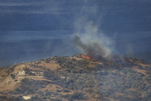 Two firemen died on the island of Crete when the wind suddenly changed direction — Costas METAXAKIS / AFP
