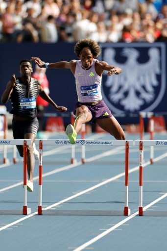 Brazil's Alison dos Santos (R) competes to win the men's 400mt hurdles event followed by Nigeria's Ezekiel Nathaniel (L) at the Silesia Diamond League athletics meeting in Katowice, Poland, on August 23, 2026. — Wojtek RADWANSKI / AFP