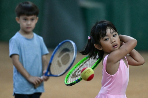 Filipino children take part in a training session in Metro Manila — Jam STA ROSA / AFP