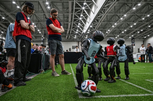 Visitors said watching robot football felt surprisingly similar to viewing a human sporting event