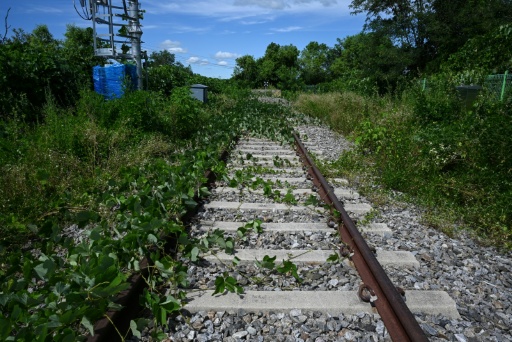 Train tracks are seen at the Baengmagoji Station in Cheorwon — GREG BAKER / AFP