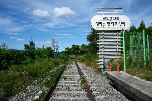 Train tracks are seen at the Baengmagoji Station in Cheorwon, Gangwon Province in South Korea, near the demilitarized zone separating North and South Korea — GREG BAKER / AFP