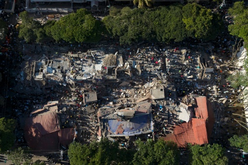Vue aérienne de bâtiments effondrés à Cali, en Colombie, après un puissant séisme, le 10 août 2026 — Joaquín SARMIENTO / AFP