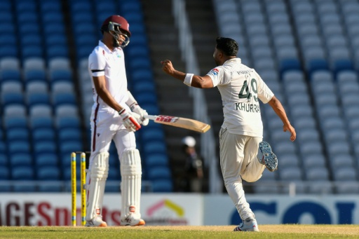 Khurram Shahzad of Pakistan celebrates after removing West Indies batsman Roston Chase — Randy Brooks / AFP