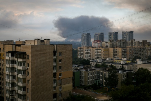 Smoke over the Ukrainian capital at sunrise — Serhii Okunev / AFP