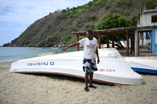 Adalberto Maypora is a well-known character around Chichiriviche de la Costa — Raul ARBOLEDA / AFP