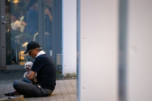 Many elderly residents have taken shelter in school gyms and municipal offices — Philip FONG / AFP