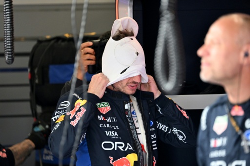 Red Bull's Max Verstappen (C) says his car is 'just not going forward' at Silverstone