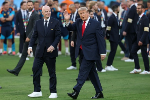 FIFA president Gianni Infantino presented the World Cup trophy to Spain alongside US President Donald Trump — Odd ANDERSEN / AFP