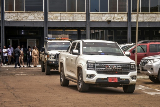 A police vehicle carrying Jewel Howard-Taylor leaves the Monrovia City Court — Matthew Jacobs / AFP