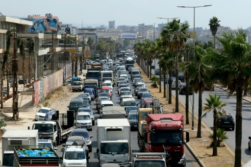 The road to Sidon was choked with traffic as some people fled their villages further south — Mahmoud ZAYYAT / AFP
