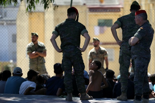 Spanish soldiers have detained some of the migrants who stayed on in Ceuta — Henry NICHOLLS / AFP