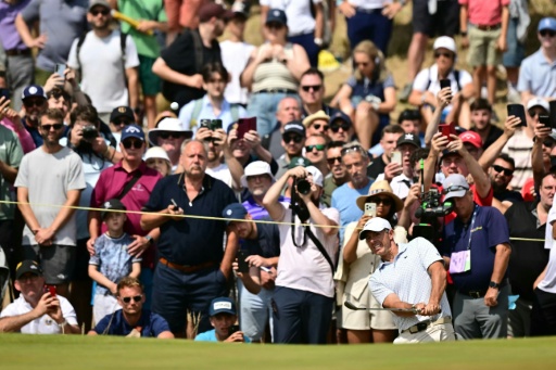 Rory McIlroy is battling to make the cut at the British Open — Ben STANSALL / AFP