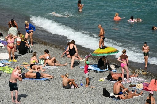 Seaside resorts, businesses and hotels that can afford them are equipped with generators — Igor IVANKO / AFP