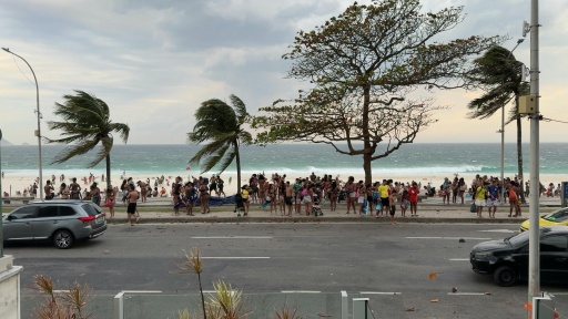 Beachgoers flee high winds in Rio de Janeiro