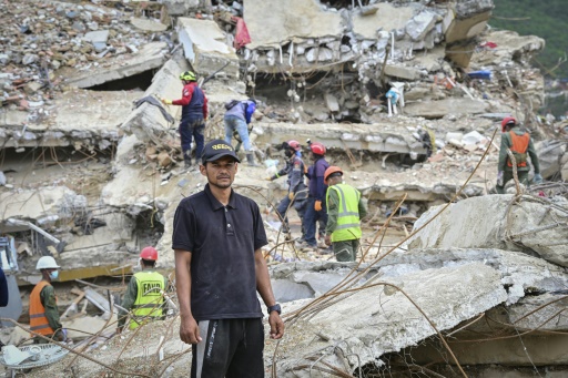 Miguel Baez is looking for the bodies of his family members in the hopes of giving them a dignified burial