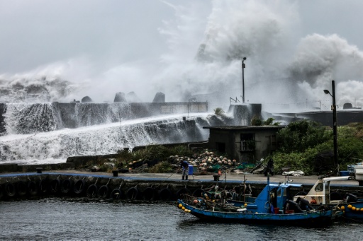 Thousands shelter in Taiwan as typhoon lashes Japan islands