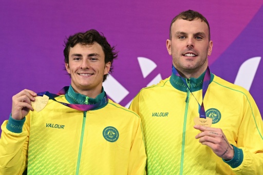 Australia's Ben Armbruster and Kyle Chalmers won gold in men's 50m Butterfly — Oli SCARFF / AFP