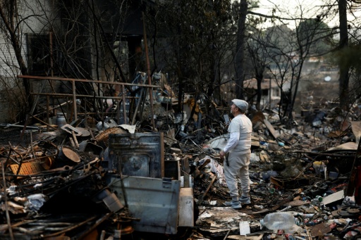 The home was reduced to a ruin — Oscar DEL POZO / AFP
