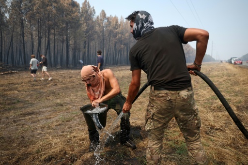 Rain dampens France fire, as Spain reports 'almost no flames'