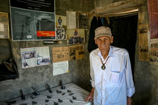Kusman in his stone hut at the entrance to the ancient fortress of Cavustepe near Van in eastern Turkey — Ozan KOSE / AFP