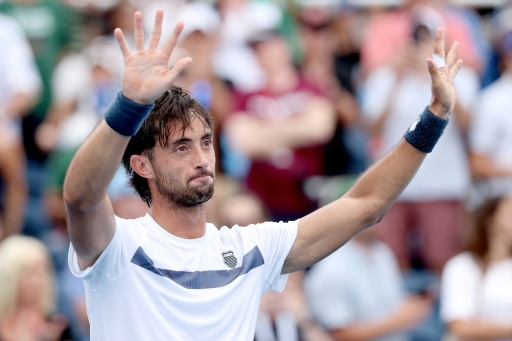 Argentina's Thiago Tirante celebrates his win over Novak Djokovic in the second round of the Cincinnati Masters — MATTHEW STOCKMAN