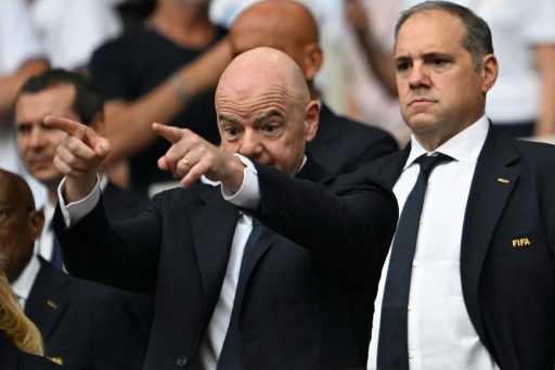 CONCACAF President Victor Montagliani (R) is viewed as a potent threat to Infantino were he to run  for FIFA chief — ROBERTO SCHMIDT / AFP