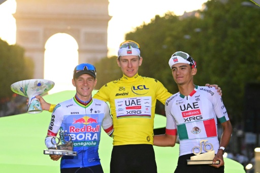 Olympic champion Remco Evenepoel (L) said that his second-place finish have proved that he was right to 'dream' of winning the Tour de France — Bernard PAPON / AFP