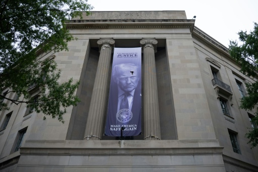 Huge banners featuring US President Donald Trump's face have appeared on major government buildings in Washington
