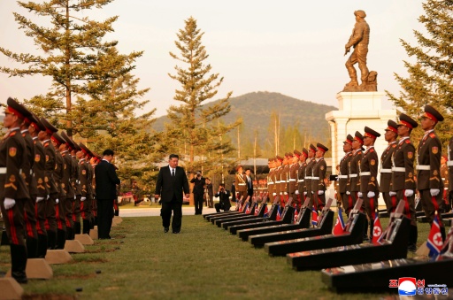 This picture taken on April 26, 2026 and released by North Korea's official Korean Central News Agency via KNS shows Kim Jong Un attending a ceremony to honour North Korean troops killed while fighting alongside Russia in the war against Ukraine — STR / AFP